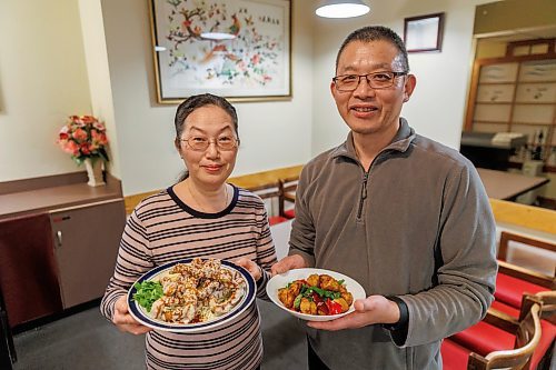 MIKE DEAL / WINNIPEG FREE PRESS
Chef, Gloria Chuang (holding Crispy Black Mushroom) and her husband and co-owner, Joseph Chen (Spicy Gluten) in their restaurant Affinity Vegetarian Garden at 208 Edmonton Street.
240129 - Monday, January 29, 2024.