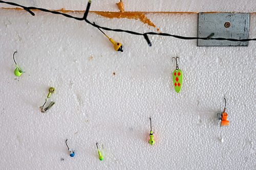 06022024
Fishing lures are hooked into the wall of Brenda Hopkie&#x2019;s ice fishing shack on the Rivers Reservoir on a mild Tuesday, which also happened to be Brenda&#x2019;s birthday.
(Tim Smith/The Brandon Sun)