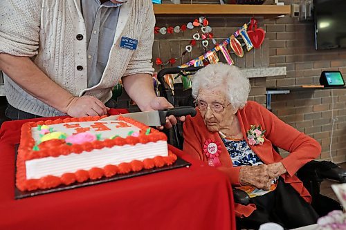 07022024
Hazel Skuce watches as a birthday cake is cut in honour of her 112th birthday at Extendicare Hillcrest Place Personal Care Home in Brandon on Wednesday afternoon.
(Tim Smith/The Brandon Sun)