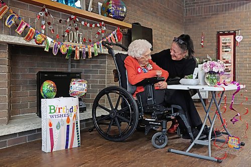 07022024
Longtime family friend Ricki Woods visits with 112-year-old Hazel Skuce as she celebrates her birthday with residents, staff and visitors at Extendicare Hillcrest Place Personal Care Home in Brandon on Wednesday afternoon.
(Tim Smith/The Brandon Sun)