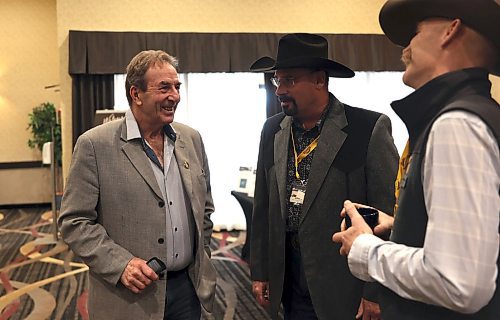 Manitoba Agriculture Minister Ron Kostyshyn talks with Mark Good, Manitoba Beef Producers treasurer, and Matthew Atkinson (far right) - outgoing president of the Manitoba Beef Producers, in Brandon's Victoria Inn on Thursday. (Michele McDougall/The Brandon Sun)