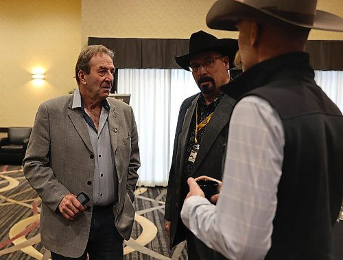 Manitoba Agriculture Minister Ron Kostyshyn talks with Mark Good, Manitoba Beef Producers treasurer and Matthew Atkinson (far right) - outgoing president of the province-wide beef producer association, in Brandon's Victoria Inn on Thursday. (Michele McDougall/The Brandon Sun)