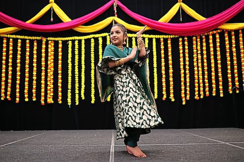 Gabbi Badhwain dances for visitors to the India pavilion in the Victoria Inn Imperial Ballroom during day two of the Westman Multicultural Festival on Friday evening. See more photos and story on Page A4. (Tim Smith/The Brandon Sun)
