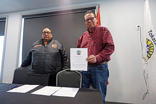 09022024
Sioux Valley Dakota Nation chief Vince Tacan holds up the memorandum of understanding signed by Tacan, Canupawakpa Dakota Nation chief Raymond Brown (L) and Dakota Plains First Nation chief Don Smoke, who joined the presser via video-link, to work together to build a casino along the Trans Canada Highway at Highway 21 south of Sioux Valley Dakota Nation. 
(Tim Smith/The Brandon Sun)