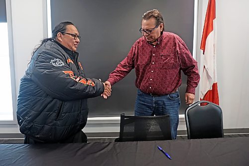 09022024
Canupawakpa Dakota Nation chief Raymond Brown and Sioux Valley Dakota Nation chief Vince Tacan shake hands at Sioux Valley after the signing of a memorandum of understanding by Brown, Tacan, and Dakota Plains First Nation chief Don Smoke to work together to build a casino along the Trans Canada Highway at Highway 21 south of Sioux Valley Dakota Nation. (Tim Smith/The Brandon Sun)