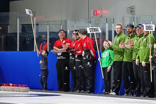 BROOK JONES / WINNIPEG FREE PRESS
Members of Team Smith during the opening ceremony of the 2024 Manitoba Men's Curling Championships - Viterra Championships at the Veterans Memorial Sports Complex in Stonewall, Man., Wednesday,  Feb. 7, 2024. Members of Team Smith (wearing red and black) include L-R: Lead Justin Twiss, second Jared Hancox, third Nick Curtis and skip Riley Smith.
