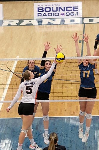 Brandon University Bobcats Kallie Ball (7) and Camryn Hildebrand attempt to block Thompson Rivers attacker Brooklyn Olfert during their final Canada West women's volleyball match on home court on Saturday. (Thomas Friesen/The Brandon Sun)