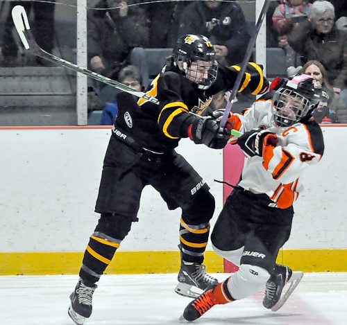 Brandon Wheat Kings defenceman Danny Cullen crushes Fort Garry forward Preston Osadac as he crossed his own blue-line Saturday action during the 53rd annual Tournament of Champions (TOC) tournament at Flynn Arena. Brandon prevailed 5-1. (Jules Xavier/The Brandon Sun)