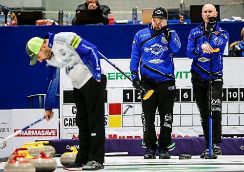 JOHN WOODS / WINNIPEG FREE PRESS
Reid Carruthers and Brad Jacobs, background right, look on as team Braden Calvert set up their shot in the Manitoba mens curling championship in Stonewall Sunday, February 11, 2024. 

Reporter: taylor