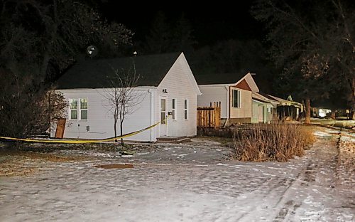 JOHN WOODS / WINNIPEG FREE PRESS
RCMP investigate at 110 3rd St NW in Carman, the scene of a murder, Sunday, February 11, 2024. 

Reporter: tyler