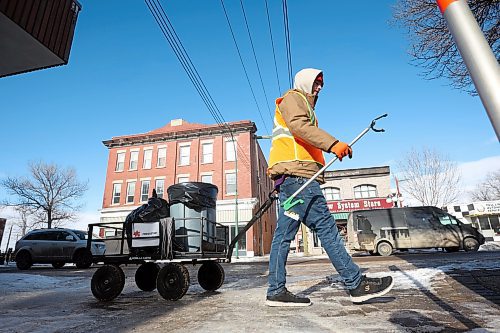 12022024
Julian McKay with the BNRC Fresh Start Specialty Cleaning Service cleans up litter from along Rosser Avenue in Brandon on Monday.
(Tim Smith/The Brandon Sun)