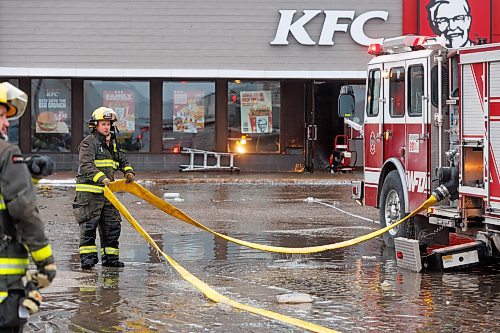 MIKE DEAL / WINNIPEG FREE PRESS
Many of the businesses at a strip mall at 1030 Keewatin Street have been destroyed by a fire that started early Monday morning. WFPS crews were still on scene dousing the building via ladder trucks.
240212 - Monday, February 12, 2024.