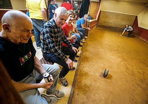 JOHN WOODS / WINNIPEG FREE PRESS
Leon Lavich, centre, and Alfred, left, and Grace Labossiere, watch Hannah Wolchock&#x2019;s shot during the Tuesday Night Bowlers league at the Belgian Bowling alley in the basement of the Belgian Club Tuesday, January 30, 2024. 

Reporter: dave