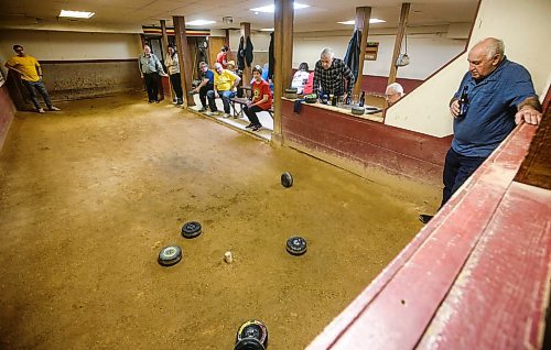JOHN WOODS / WINNIPEG FREE PRESS
Robert Van Wynsberghe, right, looks on as Josh Wolchock&#x2019;s bolle makes it&#x2019;s way to the peg during the Tuesday Night Bowlers league at the Belgian Bowling alley in the basement of the Belgian Club Tuesday, January 30, 2024. 

Reporter: dave