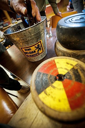 JOHN WOODS / WINNIPEG FREE PRESS
Beers and belles are part of the scene during the Tuesday Night Bowlers league at the Belgian Bowling alley in the basement of the Belgian Club Tuesday, January 30, 2024. 

Reporter: dave