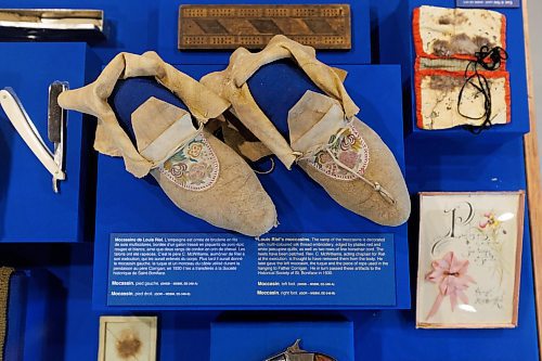 MIKE DEAL / WINNIPEG FREE PRESS
The Louis Riel Exhibit at the St. Boniface Museum.
Louis Riel's moccasins. The vamp of the moccasins is decorated with multi-coloured silk thread embroidery, edged by plaited red and white porcupine quills, as well as two rows of fine horsehair cord. The heels have been patched. Rev. C. McWilliams, acting chaplain for Riel at the execution, is thought to have removed them from the body. He later gave the left moccasin, the tuque and the piece of rope used in the hanging to Father Corrigan. He in turn passed these artifacts to the Historical Society of St. Boniface in 1930.
240206 - Tuesday, February 06, 2024.