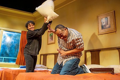 BROOK JONES / WINNIPEG FREE PRESS
 Ray Strachan (right), who is portraying Dr. Martin Luther King Jr., and Cherissa Richards, who is portraying Camae, are pictured on stage during a pillow fight scene inside his room at the Lorraine Motel while rehearsing for the Royal Manitoba Theatre Centre production of the Mountain Top in Winnipeg, Man., Tuesday, Feb. 13, 2024. The Mountain Top is a reimagination of the night before King's assassination and runs Feb. 14 to March 9 at the RMTC.