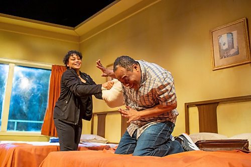 BROOK JONES / WINNIPEG FREE PRESS
 Ray Strachan (right), who is portraying Dr. Martin Luther King Jr., and Cherissa Richards, who is portraying Camae, are pictured on stage during a pillow fight scene inside his room at the Lorraine Motel while rehearsing for the Royal Manitoba Theatre Centre production of the Mountain Top in Winnipeg, Man., Tuesday, Feb. 13, 2024. The Mountain Top is a reimagination of the night before King's assassination and runs Feb. 14 to March 9 at the RMTC.