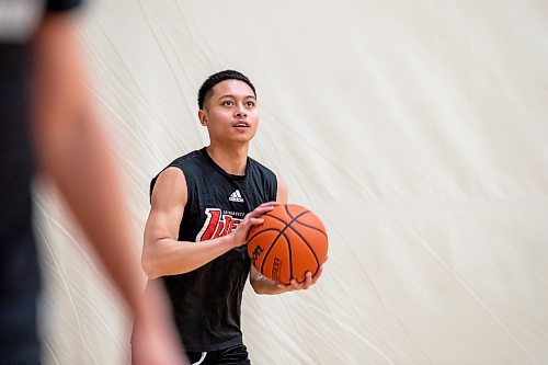 BROOK JOJNES / WINNIPEG FREE PRESS
University of Winnipeg Wesmen men's basketball team guard Shawn Maranan, who graduated from &#xc9;cole Sisler High School, is about to shoot a basketball during a team practice at the Dr. David F. Anderson Gymnasium inside the Duckworth Centre at the University of Winnipeg in Winnipeg, Man., Tuesday, Feb. 13, 2024.