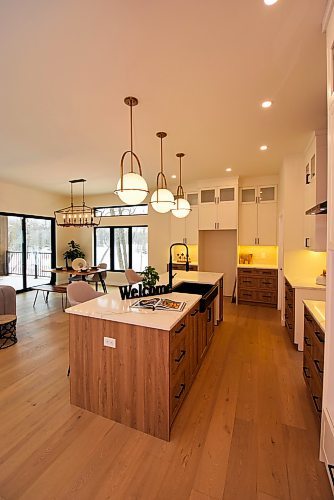 Todd Lewys / Winnipeg Free Press 
The kitchen and dining area in this large bungalow sports a seamless synergy of elegance and efficiency.