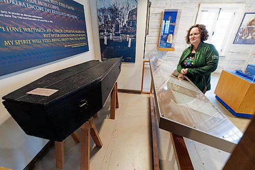 MIKE DEAL / WINNIPEG FREE PRESS
Cindy Desrochers, director with the St. Boniface Museum discusses the history of Louis Riel&#x2019;s coffin in the Louis Riel Exhibit.
240206 - Tuesday, February 06, 2024.