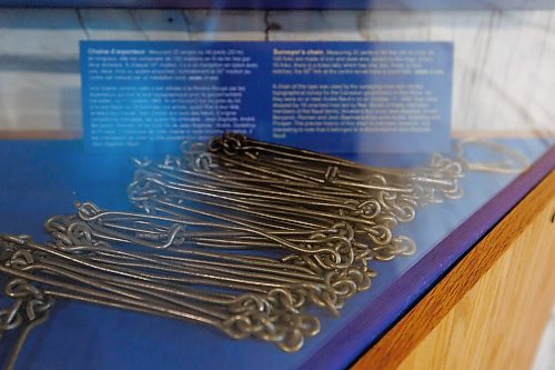 MIKE DEAL / WINNIPEG FREE PRESS
The Louis Riel Exhibit at the St. Boniface Museum.
Surveyor's chain. Measuring 22 yards or 66 feet (20 m) long, its 100 links are made of iron and steel wire, joined by two rings. Every 10 links, there is a brass tally which has one, two, three, or four notches; the 50* link at the centre would have a round tally. 
A chain of this type was used by the surveying crew who did the topographical survey for the Canadian government in Red River. As they were on or near Andre Nault's lot on October 11, 1869, they were stopped by 16 unarmed men led by Riel. Seven of these men were members of the Nault family, Amable's four sons Jean-Baptiste, Andr&#xe9;, Benjamin, Romain and Jean-Baptiste's three sons Andre, Godefroy and Prosper. The precise history of this chain is unknown; however, it is interesting to note that it belonged to a descendant of Jean-Baptiste Nault.
240206 - Tuesday, February 06, 2024.
