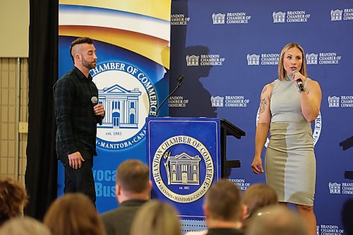 Rocked Community Fitness co-owners Jenn and Zach McMillan speak during the Brandon Chamber of Commerce February luncheon on Thursday at the Keystone Centre. (Abiola Odutola/The Brandon Sun)