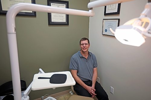 15022024
Denturist Kyle Ryan of Kyle Ryan Denture Clinic at his clinic on 8th Street in Brandon on Wednesday. (Tim Smith/The Brandon Sun)