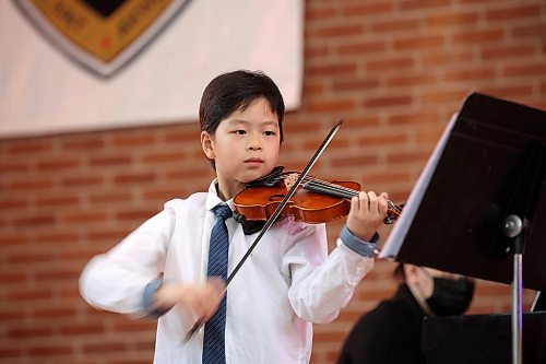 15022024
YiChen Liu performs First Dance Canadian by Hector Gratton in the Violin Solo, Canadian Composers, Grade/Level 7 (I) category in the Strings portion of the Brandon Festival of the Arts at Knox United Church on Thursday. (Tim Smith/The Brandon Sun)