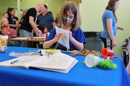 Acelynn Carmicheal concentrates on crafting during Louis Riel Day celebrations at the Manitoba Métis Federation’s southwest region’s building in Brandon on Monday. (Michele McDougall/The Brandon Sun)  