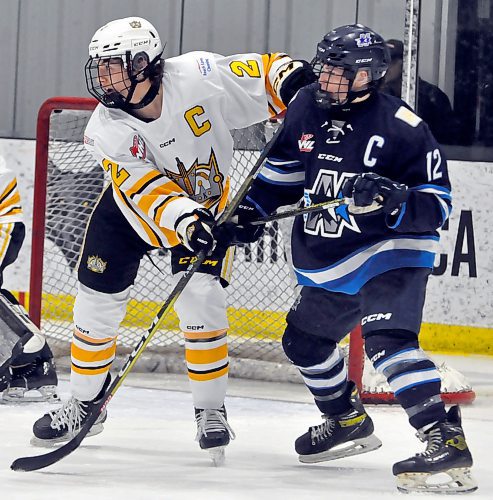 First team all-star defenceman Owen Wallace (2) of the Brandon Wheat Kings battles for position in front of his net with Parkland Rangers captain Landyn Garton (12) during a Jan. 3 game at J&G Homes Arena. (Jules Xavier/The Brandon Sun)