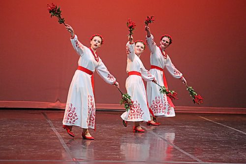 Olivia Bryden, Gracelyn Powell and Marin Federowich perform a folk dance trio in the 14 years and under category during the Brandon Festival of the Arts competition at the Western Manitoba Centennial Auditorium on Thursday afternoon. (Matt Goerzen/The Brandon Sun)