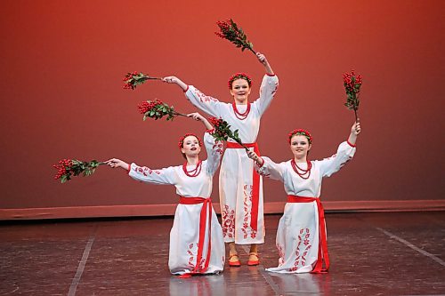 Olivia Bryden, Gracelyn Powell and Marin Federowich peform a folk dance trio in the 14 years and under category during the Brandon Festival of the Arts competition at the Western Manitoba Centennial Auditorium on Thursday afternoon. (Matt Goerzen/The Brandon Sun)