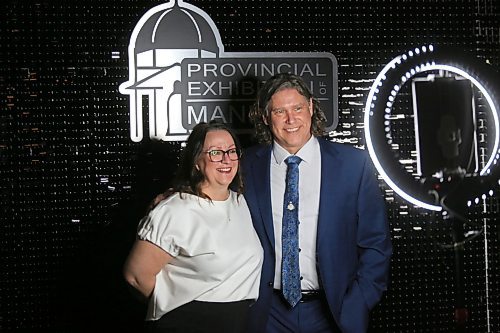 Brandon Mayor Jeff Fawcett poses for a photo with his wife Jodi Fawcett at a special digital photo booth set up for the Provincial Exhibition of Manitoba's President's Dinner on Thursday evening at the Victoria Inn. (Matt Goerzen/The Brandon Sun)