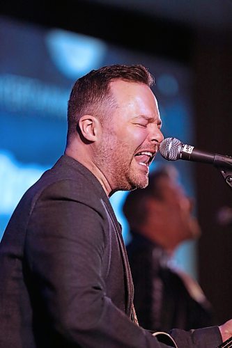 Doc Walker singer and guitarist Dave Wasyliw belts out the lyrics to Rocket Girl during an accoustic performance by the band during the Provincial Exhibition of Manitoba's President's Dinner at the Victoria Inn on Thursday evening. (Matt Goerzen/The Brandon Sun)