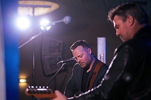 Doc Walker singer and guitarist Dave Wasyliw plays with fellow musician Chris Thorsteinson during an accoustic performance by the duo during the Provincial Exhibition of Manitoba's President's Dinner at the Victoria Inn on Thursday evening. (Matt Goerzen/The Brandon Sun)