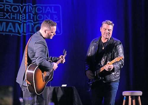 Doc Walker duo Dave Wasyliw, left, and Chris Thorsteinson play some fan favourites during a special accoustic performance for the Provincial Exhibition of Manitoba's President's Dinner on Thursday evening. (Matt Goerzen/The Brandon Sun)