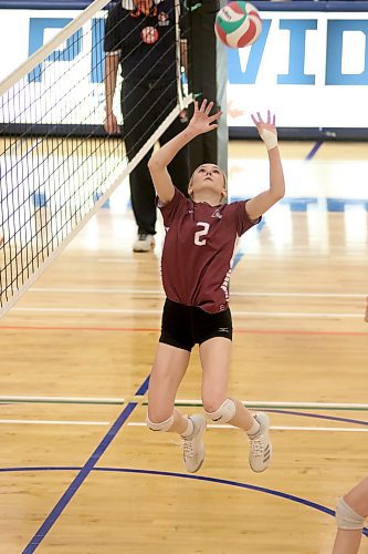 Brooke Schoonbaert of the ACC Cougars sets against the CMU Blazers during their Manitoba Colleges Athletic Conference women's volleyball semifinal in Niverville on Saturday. (Thomas Friesen/The Brandon Sun)