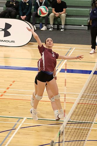 Heather Brost of the ACC Cougars attacks against the CMU Blazers during their Manitoba Colleges Athletic Conference women's volleyball semifinal in Niverville on Saturday. (Thomas Friesen/The Brandon Sun)