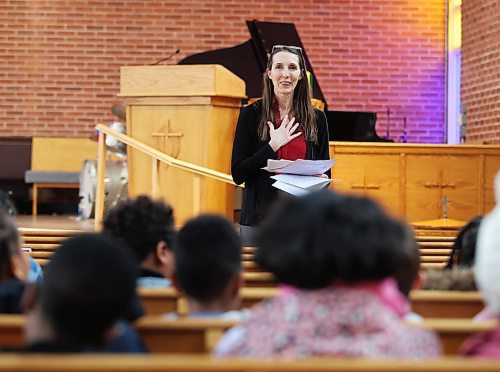 Elizabeth Rotoff, adjudictator from Winnipeg, speaks to Grade 3 and 4 students from Christian Heritage School after their speech choir competition during this year's Brandon Festival of the Arts at Knox United Church on Monday. (Michele McDougall/The Brandon Sun)