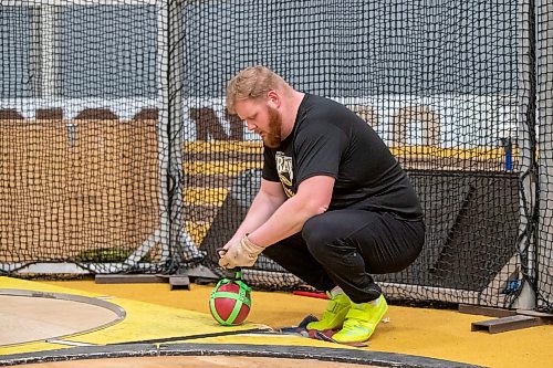 BROOK JONES / WINNIPEG FREE PRESS
University of Manitoba Bisons men's track &amp; field team athlete Graham Wright, who competes in weight throw, focuses for a moment during a training training session at the James Daly Fieldhouse at the University of Manitoba Fort Garry campus in Winnipeg, Man., Tuesday, Feb. 27, 2024. The Bisons men's team captured the Canada West Track &amp; Field Championships for the third year in a row. Wright will be competing at the upcoming U Sports Track &amp; Field Championships in Winnipeg March 7 to 9, 2024.