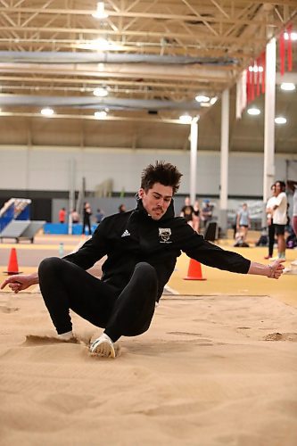 BROOK JONES / WINNIPEG FREE PRESS
University of Manitoba Bisons men's track &amp; field team athlete Daxx Turner lands in the sand pit while practicing triple jump while while training at the James Daly Fieldhouse at the University of Manitoba Fort Garry campus in Winnipeg, Man., Tuesday, Feb. 27, 2024. The Bisons men's team captured the Canada West Track &amp; Field Championships for the third year in a row. Kendle will be competing at the upcoming U Sports Track &amp; Field Championships this fourth year in a row.