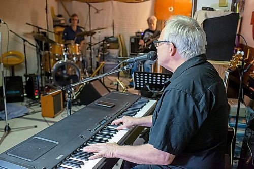 BROOK JONES / WINNIPEG FREE PRESS
Fuse band member Don Hatcher sings while playing the keyboard during a band practice inside the rec room at Paul Hatcher's house in Winnipeg, Man., Monday, Feb. 26, 2024. Other members of Fuse include lead vocalist Jeff Hatcher, who also plays guitar and harmonica, drummer Paul Hatcher,  bass guitarist John Neal, David Briggs who plays keyboard, and Laurie MacKenzie, who plays guitar. The Fuse will be releasing their latest CD during the band's annual fundraiser show at the Park Theatre in Winnipeg Saturday, March 2, 2024. Singer Wendy Bird from Vancouver, B.C., will also join the band on stage.