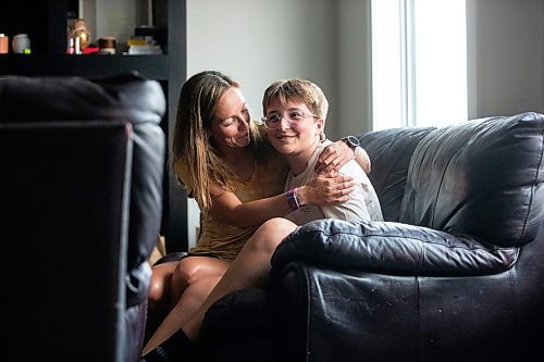 MIKAELA MACKENZIE / WINNIPEG FREE PRESS

Jill Chapman and her son, Adam Donaghy, at their home on Thursday, July 13, 2023. Adam Donaghy is a transgender high schooler who has been on the waiting list for HSC&#x2019;s Gender Dysphoria Assessment and Action for Youth Centre (GDAAY) program for nearly three years.  For Eva/Katie story.
Winnipeg Free Press 2023.