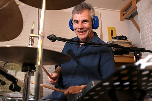 BROOK JONES / WINNIPEG FREE PRESS
Fuse band member Paul Hatcher smiles while playing the drums during a band practice inside the rec room at his house in Winnipeg, Man., Monday, Feb. 26, 2024. Other members of Fuse include lead vocalist Jeff Hatcher, who also plays guitar and harmonica, Don Hatcher, who plays guitar, keyboard player David Briggs, bass guitarist John Neal, and guitar player Laurie MacKenzie. The Fuse will be releasing their latest CD during the band's annual fundraiser show at the Park Theatre in Winnipeg Saturday, March 2, 2024. Singer Wendy Bird from Vancouver, B.C., will also join the band on stage.
