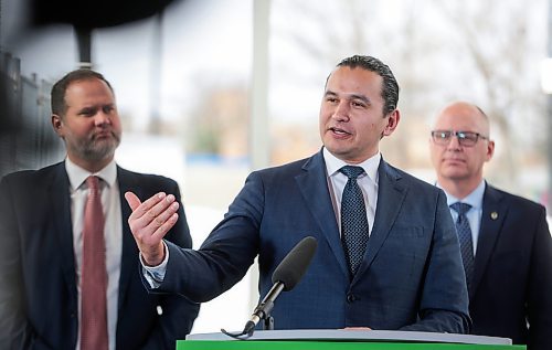 Premier Wab Kinew, flanked by Justice Minister Matt Wiebe (left) and Winnipeg Mayor Scott Gillingham, speaks during a press conference on bail reform in Winnipeg on Thursday. (Ruth Bonneville/Winnipeg Free Press
 