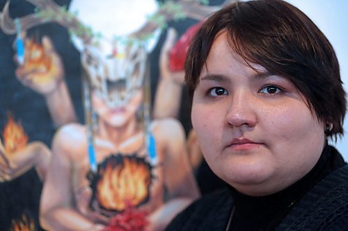 Indigenous artist Anja Pickel stands beside one of her works on Thursday afternoon that will be on display at the Indigenous Art: Beyond History exhibit at the Glen P. Sutherland Gallery of Art on Victoria Avenue. The exhibit opens to the public this evening between 7-9 p.m. and will be on display until March 15. (Matt Goerzen/The Brandon Sun)