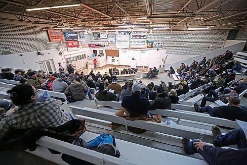 A large crowd of producers take in the herd dispersal auction at the Heartland Livestock Services auction mart in Brandon on Thursday afternoon. The auction was held for Minnedosa cattle producer Bruce Curle of Curle Farms, who decided it was time to start winding down his operation after 32 years on the farm. (Matt Goerzen/The Brandon Sun)