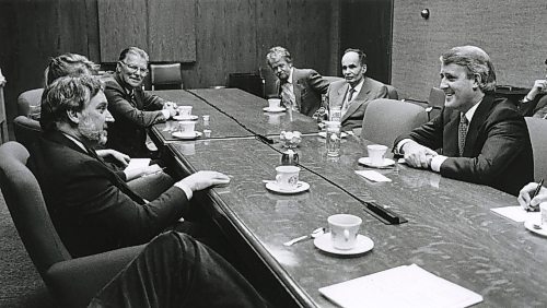 Winnipeg Free Press Editor John Dafoe in boardroom meeting at the Free Press with Brian Mulroney  Oct 9 1988 along with editorial staff at the paper.