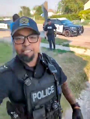 A still frame from a video taken on Sept. 3, 2023 shared with the Brandon Sun shows a Brandon Police Service officer during an incident that was investigated by the Independent Investigation Unit of Manitoba. On Friday, the IIU announced that a BPS officer had been charged in connection with the incident. (File)